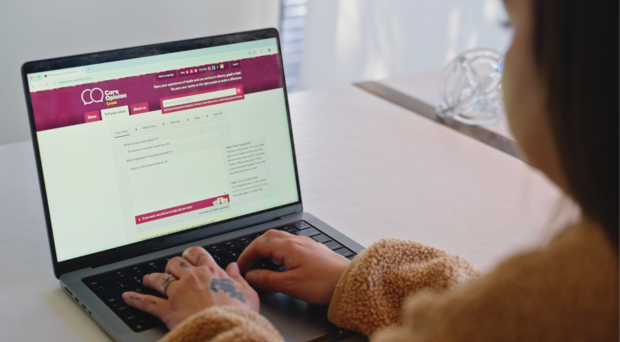 The Care Opinion website on a laptop screen